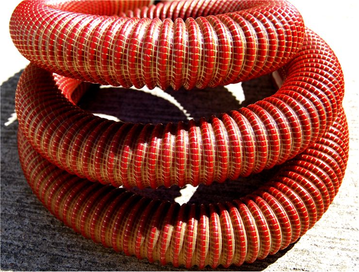 Picture Of Red Vacuum Cleaner Hose